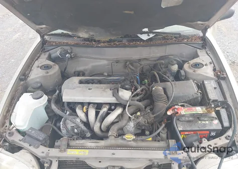 1999 Toyota Corolla Ce z USA, uszkodzony, nr VIN 2T1BR12E3XC221038